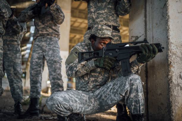 istock Soldier in action with his team 1352942866