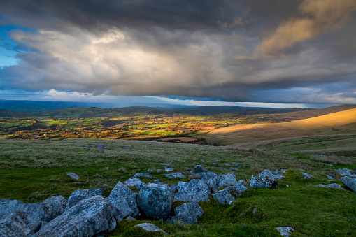 Rain clouds threaten a downpour over the Black Mountain in South Wales UK