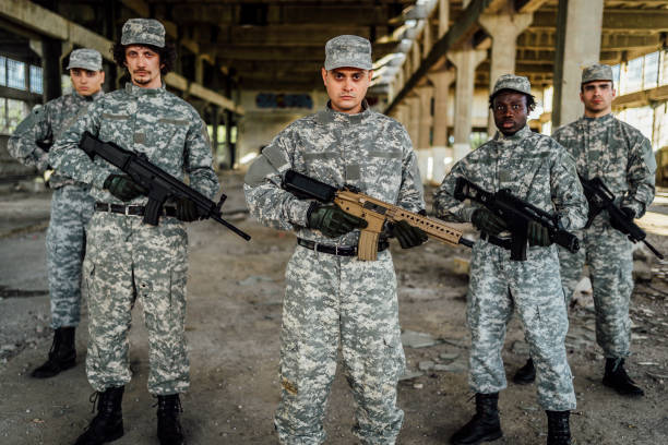 istock Soldiers with shotguns 1352944825