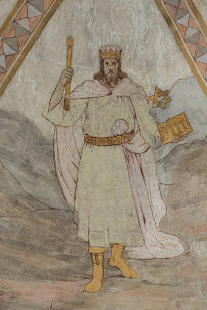 ancient fresco of king Solomon with the temple and a scepter in his hands, a 120 years old fresco stock photo