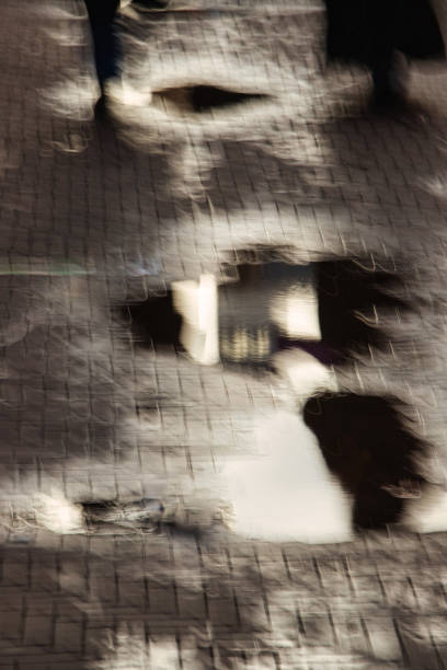 mysterious long exposure water puddles on brick street