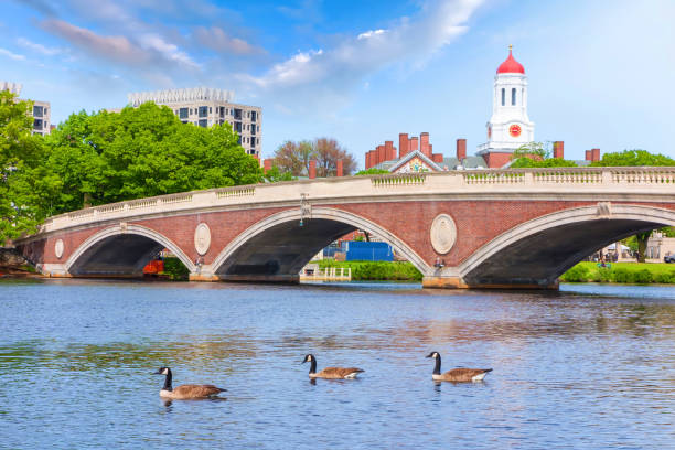 istock Vintage Bridge with clock tower over Charles River Boston 1352959511