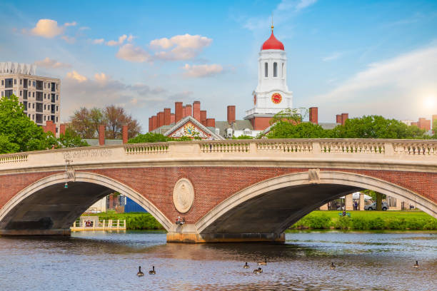 istock Vintage Bridge with clock tower over Charles River Boston 1352959522