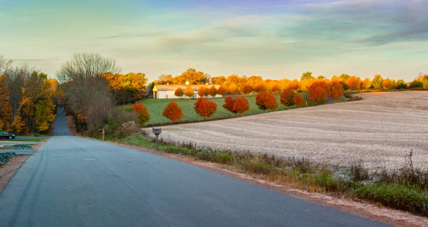 istock Road going through a Wisconsin countryside in October 1352961241