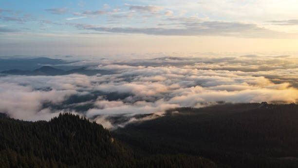 istock Morning Cloud Courtain In Mountains Aerial View 1352962708