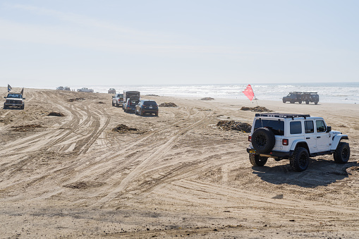 Oceano Dunes State Vehicular Recreation Area, the only California State Park that allows non-street-legal vehicles to drive on the beach.  Oceano, California, USA - November, 6, 2021