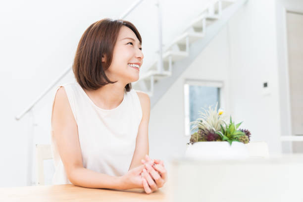 istock attractive asian woman relaxing 1352973588