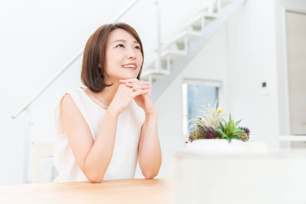 istock attractive asian woman relaxing 1352973638