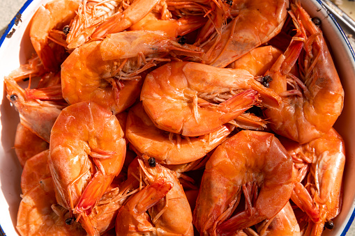 A plate of cooked shrimp