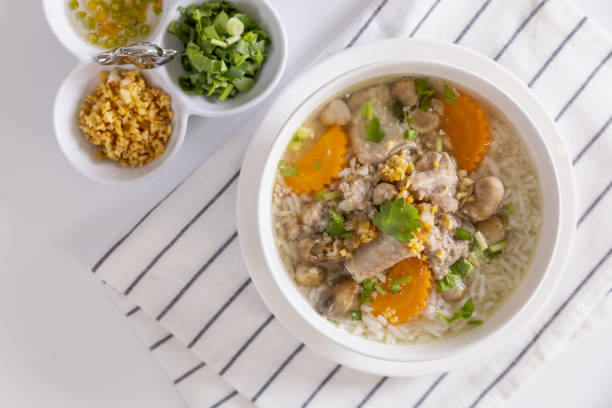 istock Pork boiled rice a white bowl on a table for breakfast. 1352984716