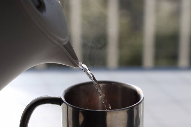 istock Pour hot water into a coffee cup and drink instant coffee 002 1352989366