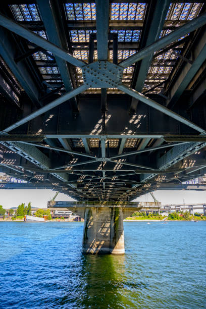 istock Hawthorn Bridge with openwork trusses and concrete supports over the Willamette  River in downtown Portland 1353001026