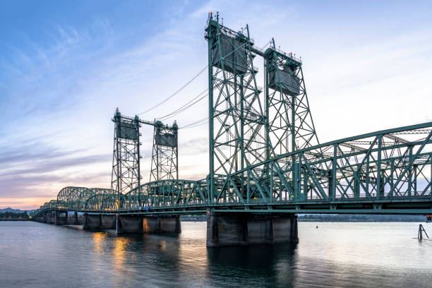 istock Transport Interstate Columbia River drawbridge against the backdrop of a cloudy sky at twilight 1353001385