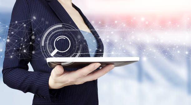 istock Search Bar for ui. Search Address and navigation bar icon. Hand hold white tablet with digital hologram search data sign on light blurred. Searching information data on internet networking. 1353001699