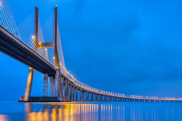 istock The Vasca da Gama bridge across the river Tagus 1353001949