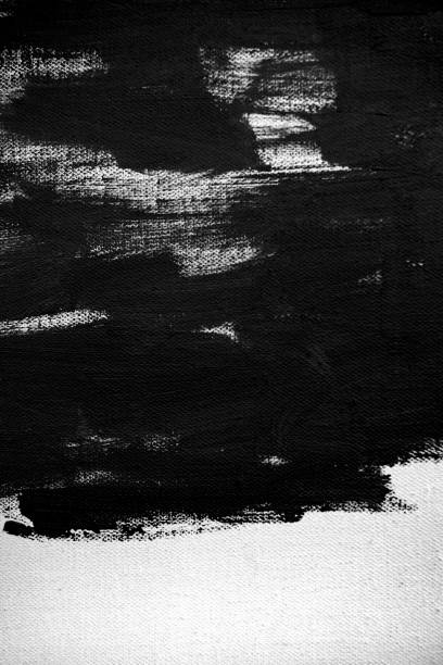 istock Close up Texture Black color paint on white colour canvas Brush marks stroke for paper graphic design on background 1353008694