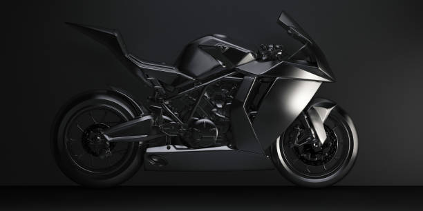 black sports motorcycle in the dark side view stock photo