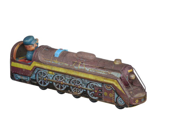 istock side view di cut ancient zinc train toy on white background,object,copy space 1353022918