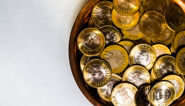istock Stack of Indian 10 rupee currency coins on a white background 1353023483
