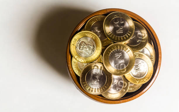 istock Stack of Indian 10 rupee currency coins on a white background 1353023498