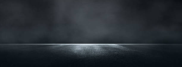 istock Asphalt abstract dark black background with  smoke. Dark street empty. 1353024855