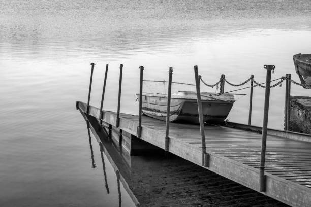 istock Old leisure boat. Black and white photo 1353026692
