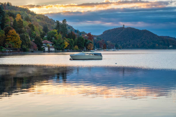 Winter sunrise over lake Orta waters. Color image stock photo