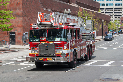 Boston, USA. May 11: Boston ladder 24 city fire department truck seen attending a call in the city