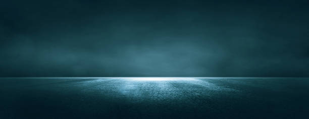 istock Blue Asphalt  dark street with smoke. 1353028197
