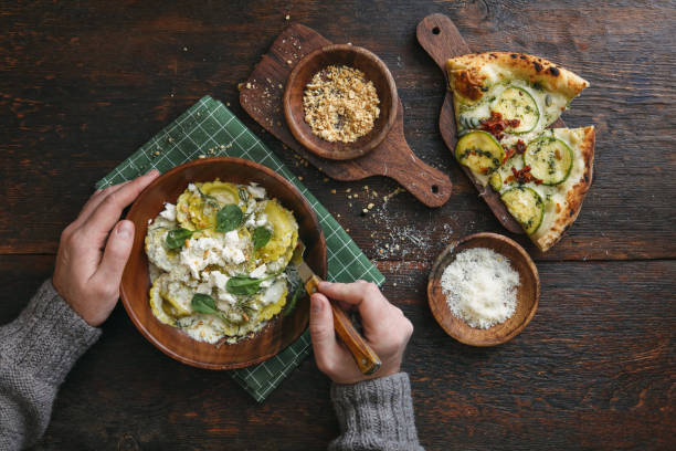 Man Eating Vegan Spinach and Ricotta Ravioli