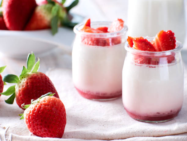 istock Glasses with natural yogurt and fresh strawberries 1353031323