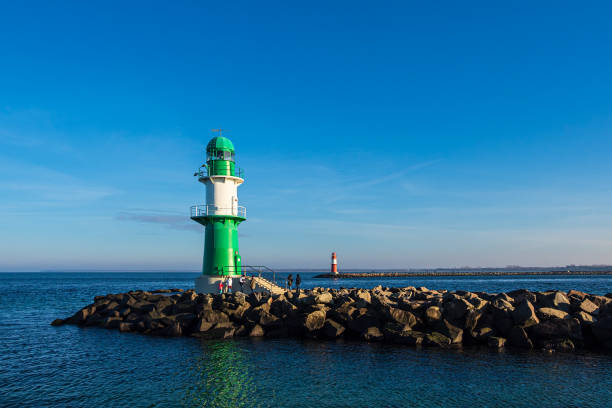 istock Mole on the Baltic Sea coast in Warnemuende, Germany 1353032392