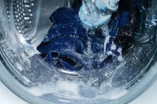 istock Linen washing in the washing machine. 1353032875