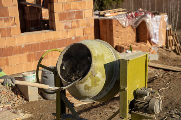 Concrete mixer installed on the construction site Mixing concret on mortar mixer machine. best precious metals ira custodian stock pictures, royalty-free photos & images