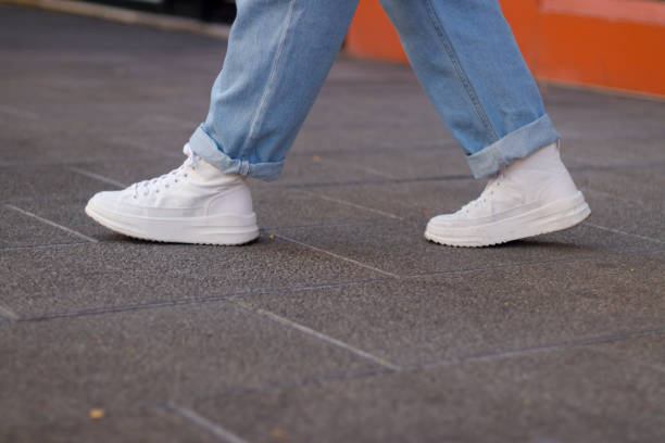 istock Close up of a person's shoes 1353037771