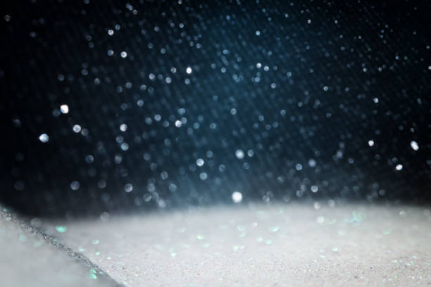 istock background of abstract glitter lights. silver, blue and black. de focused 1353042770