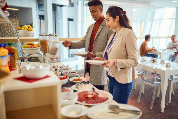 istock Business People Having Meal Together.serving food 1353044281