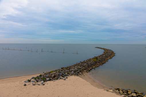 Erosion of marine protection on the beach, Ijsselmeer, Friesland, Netherlands