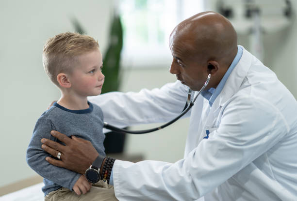 istock Letting the Doctor Listen to My Lungs 1353047413