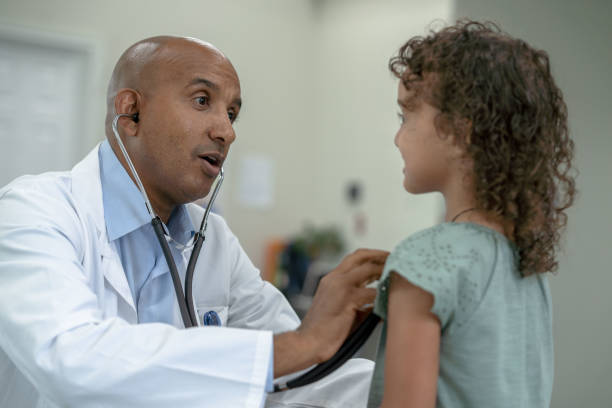 istock Listening to a Young Patients Heart 1353047419