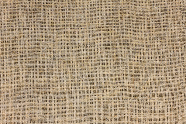 istock Brown burlap with beautiful canvas texture of brown fabric in retro style 1353048845