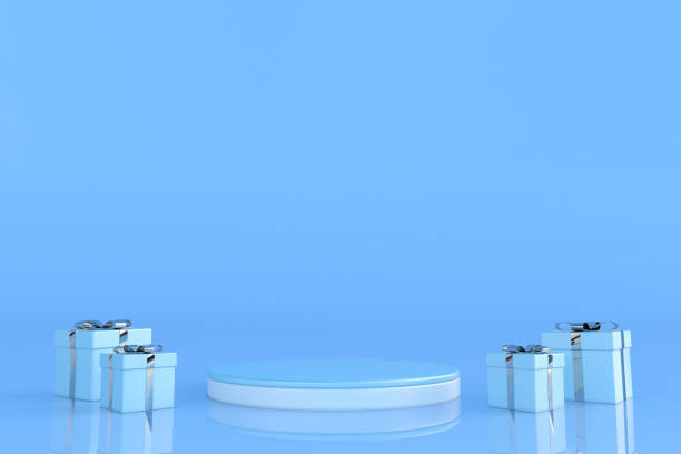 istock Silver blue gift box with bow ribbon and empty podium display stand on pastel background. 1353052339