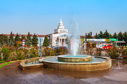 Mineralnye Vody, Russia - September 30, 2020: Fountain near the Mineralnye Vody railway station historic building