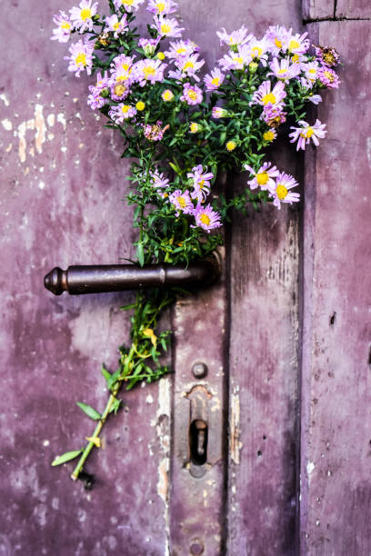 Flower bouquet on a door