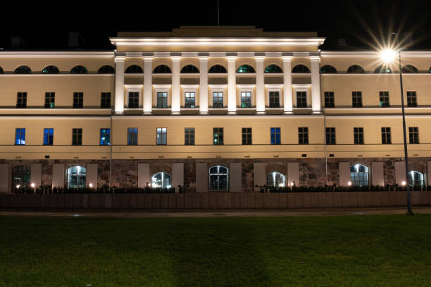 Renovated building exterior of Finnish ministry for foreign affairs illuminated during the nighttime stock photo