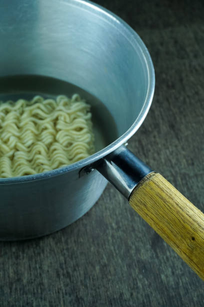 istock Instant Noodles in a stainless steel pot 1353074235