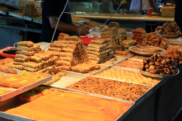 istock sweets market stall in Carmel Market 1353076487