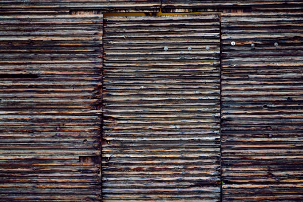 Weathered wood in building. Italy autumn 2021 in the Dolomites