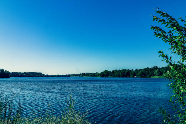istock View of a large lake in summer. 1353079275