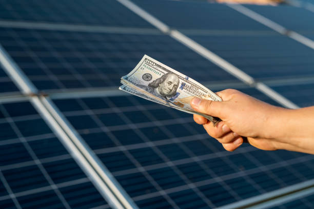 istock Saving money with sun energy and solar panels 1353079325